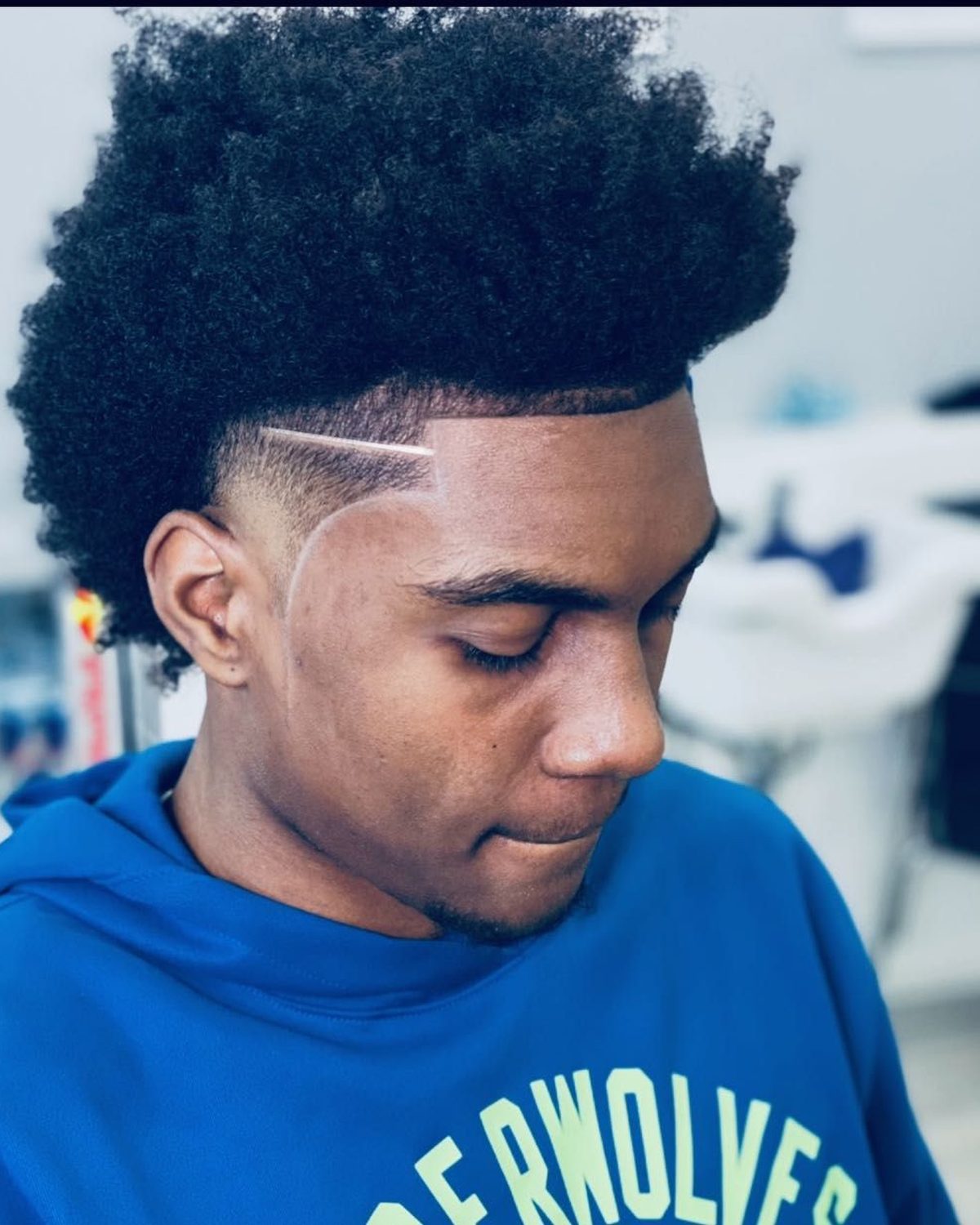 Curly top with hard part and design by Dutch
