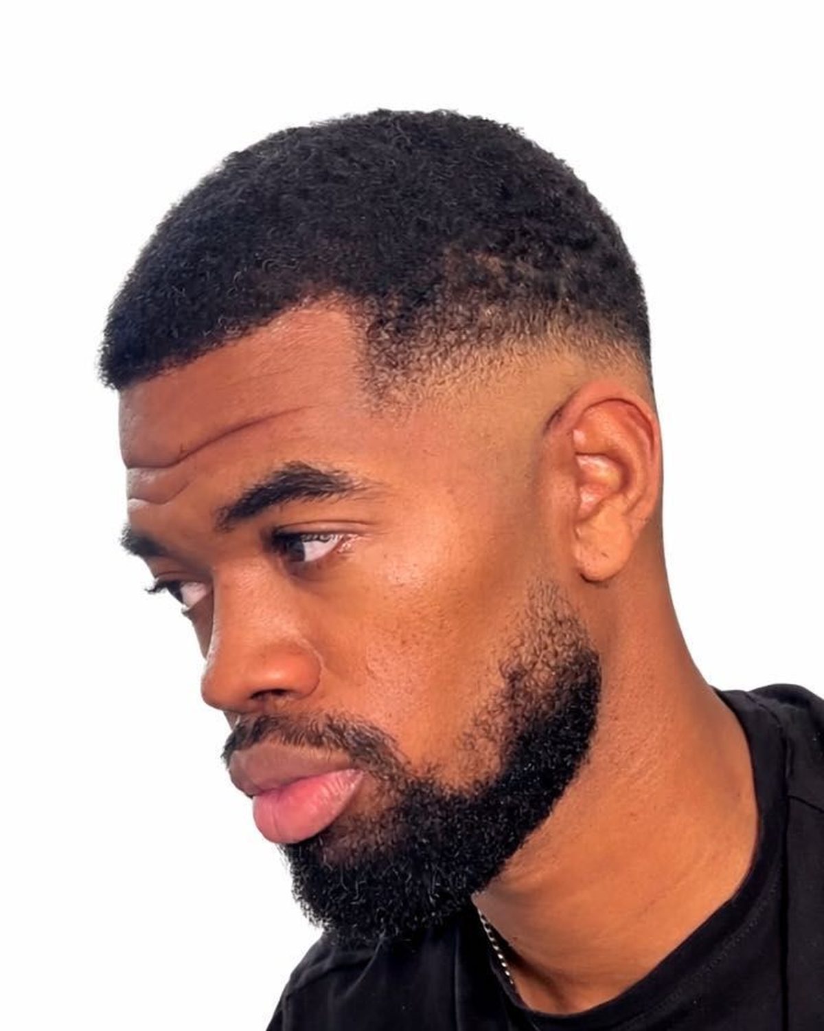 Skin fade and full beard shape by Brian